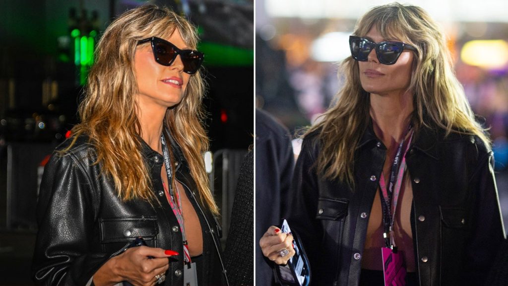 Heidi Klum struts topless at F1 in Las Vegas; joins Brad Pitt, Justin ...