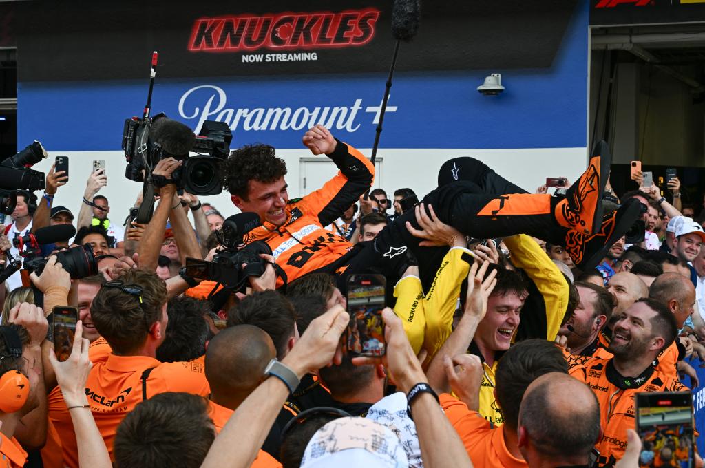 Lando Norris celebrates F 1 Miami win with insane dive into crew ...