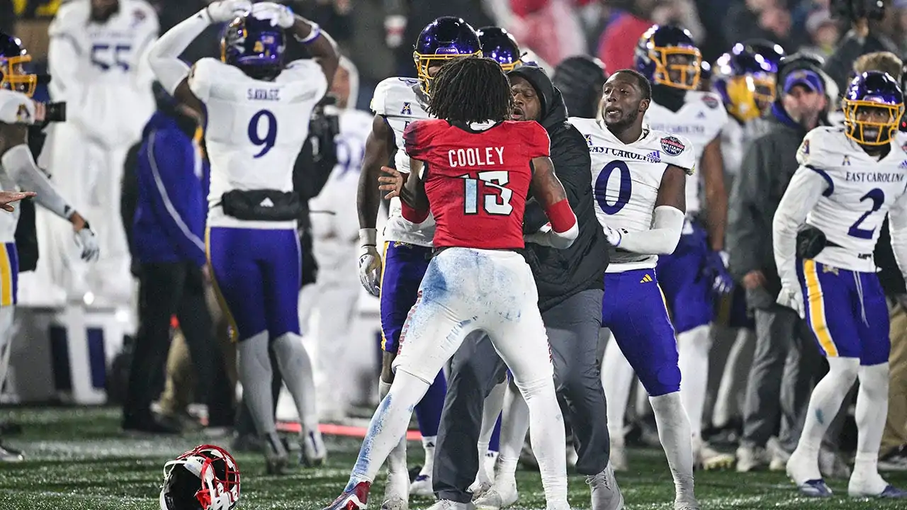 Referee bloodied in ugly NC StateEast Carolina Military Bowl brawl