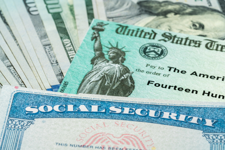 What is causing the increase in Americans applying for Social Security benefits?
