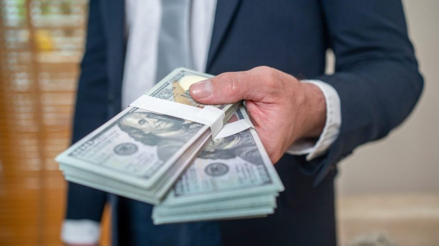 Address the wealth gap by altering the corporate tax system