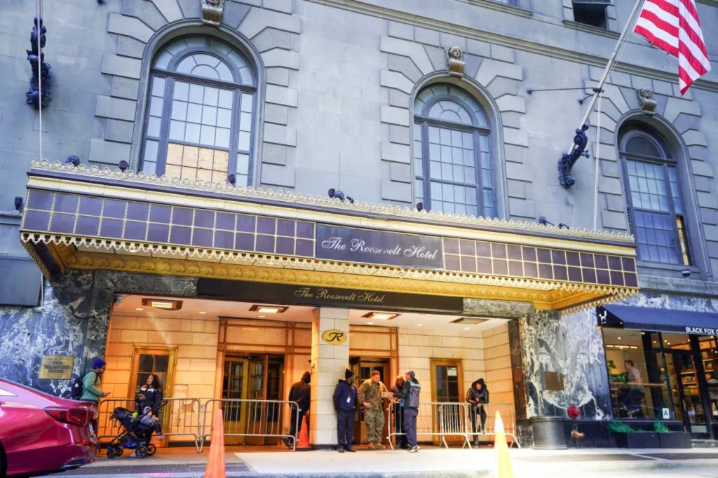 As migrants leave Roosevelt Hotel, the sought-after building encounters a new phase of development.