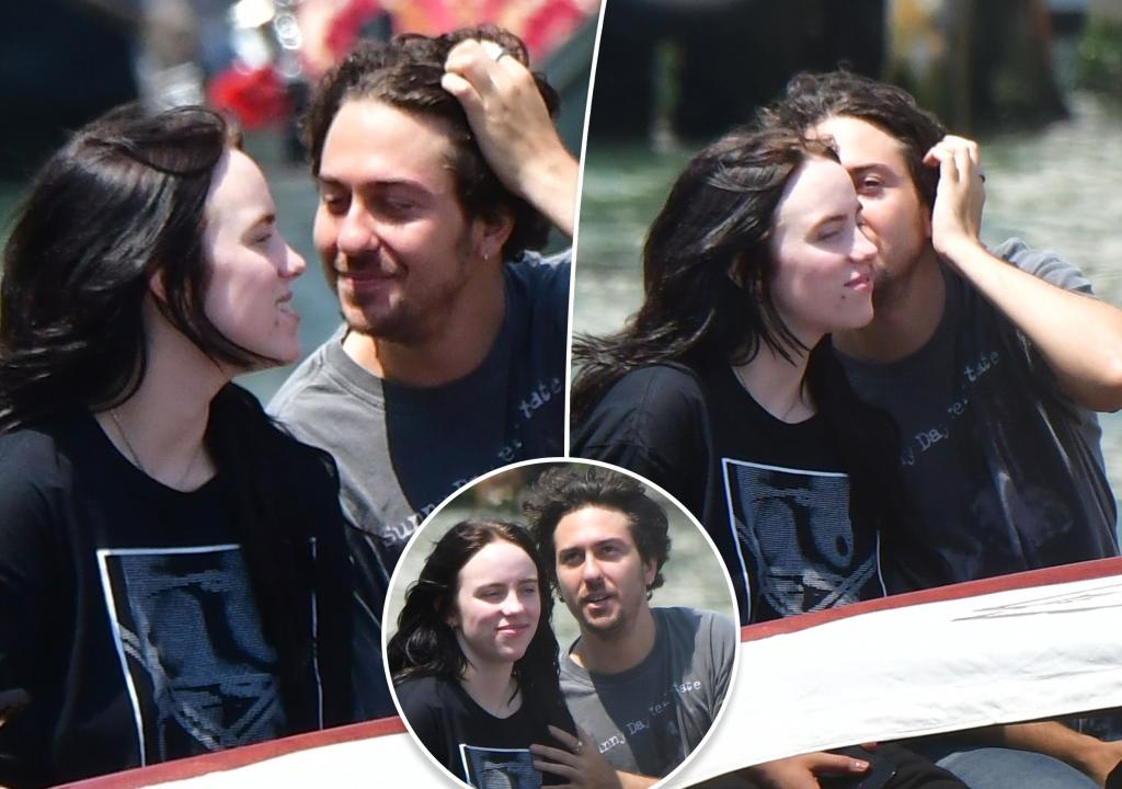 Billie Eilish and Nat Wolff enjoy a boat ride together, showing affection during their time in Venice.