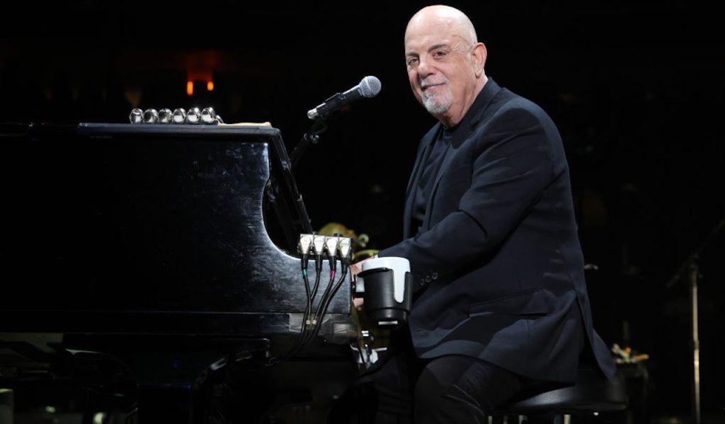 Billy Joel humorously remarks that aging is tough amid health struggles.