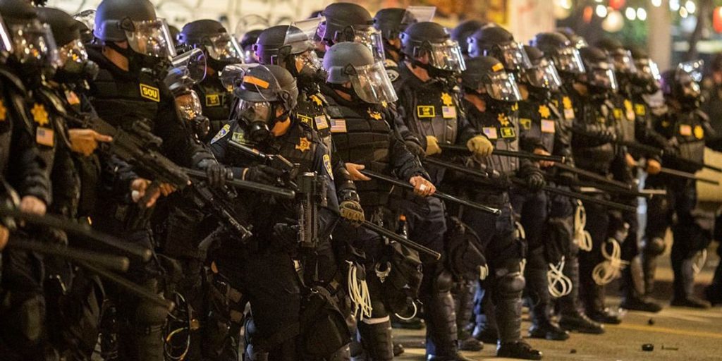 California lawmaker seeks to prohibit masks for police officers