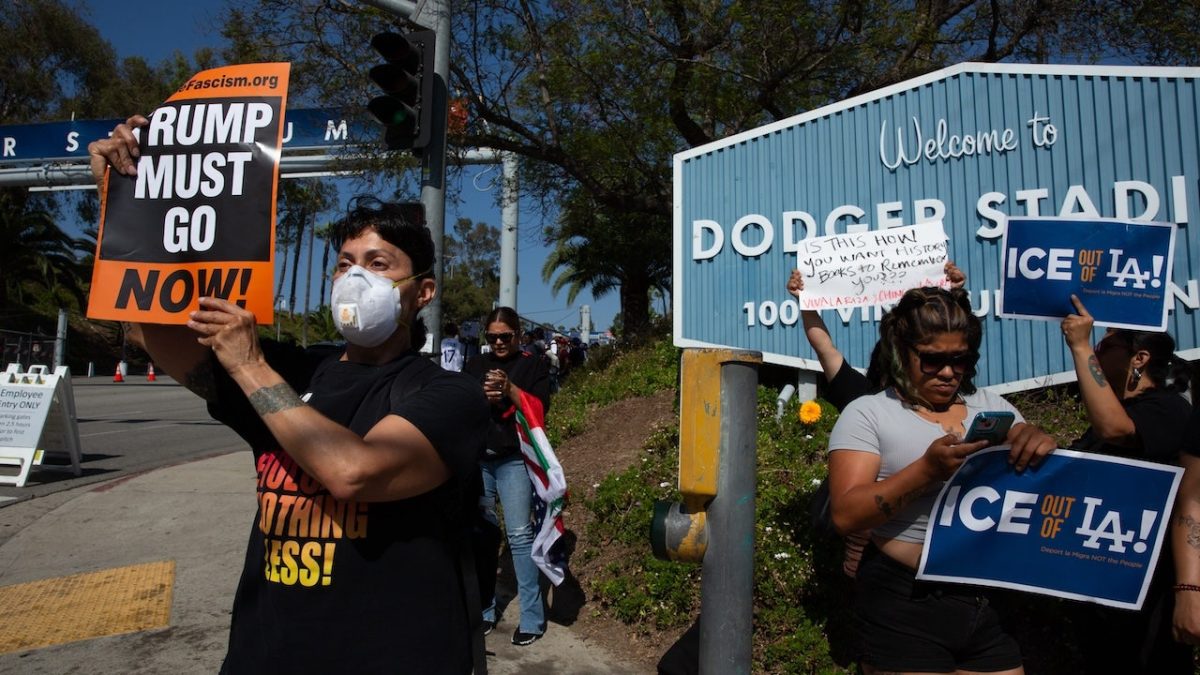 Demonstrators assemble at Dodger Stadium during ICE issues in Los Angeles