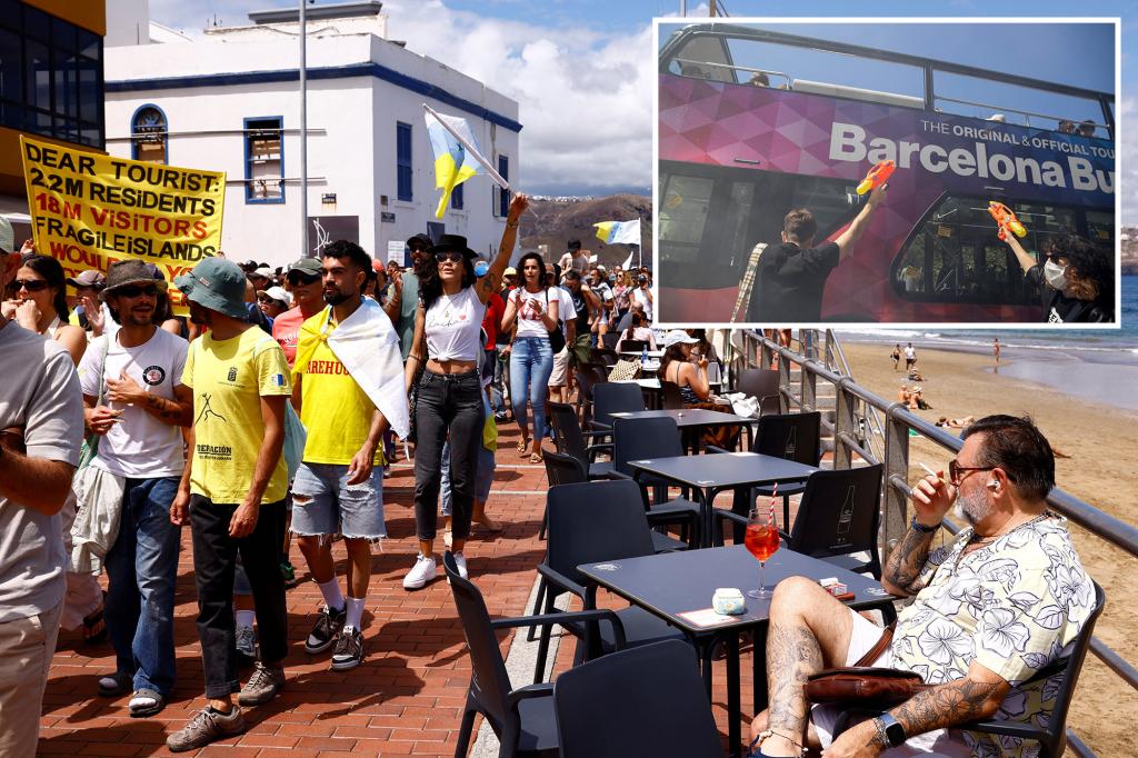 Europeans targeting attractions and tour buses with water guns to protest the commercialization of cities