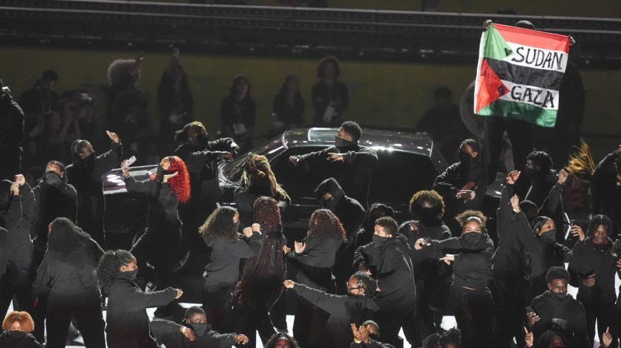 Halftime performer at the Super Bowl taken into custody months after demonstration