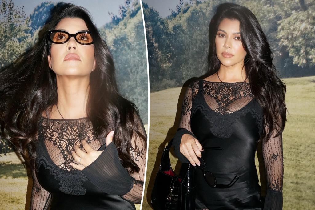 Kourtney Kardashian dazzles in a sheer lace mini dress