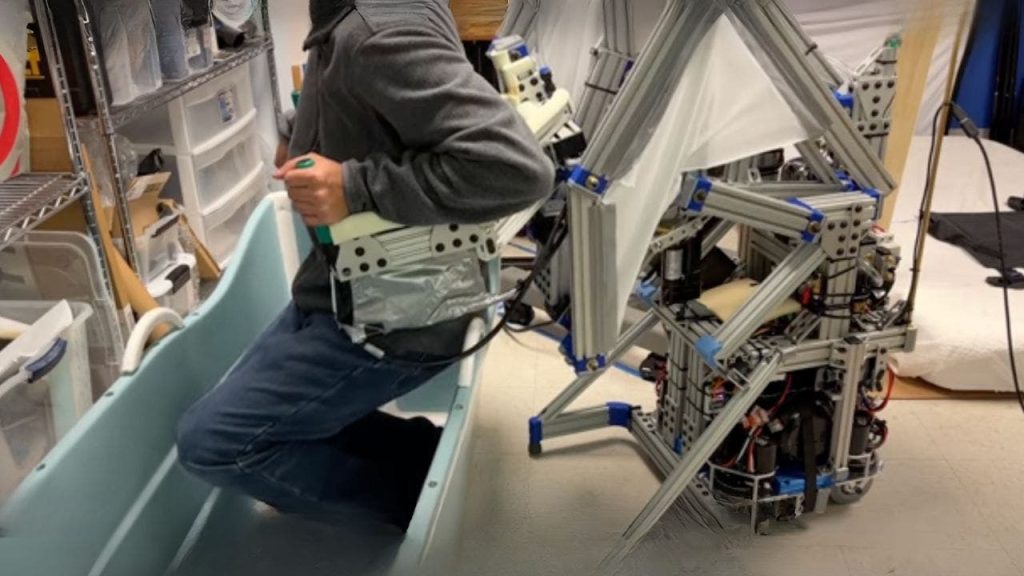 MIT's E-BAR robot aids in fall prevention as the senior population in the US expands quickly.