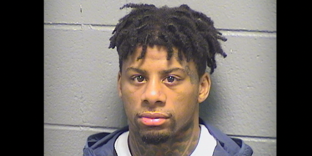 Man taken into custody nearly two months after a couple willingly surrendered their belongings to armed individuals outside their house.