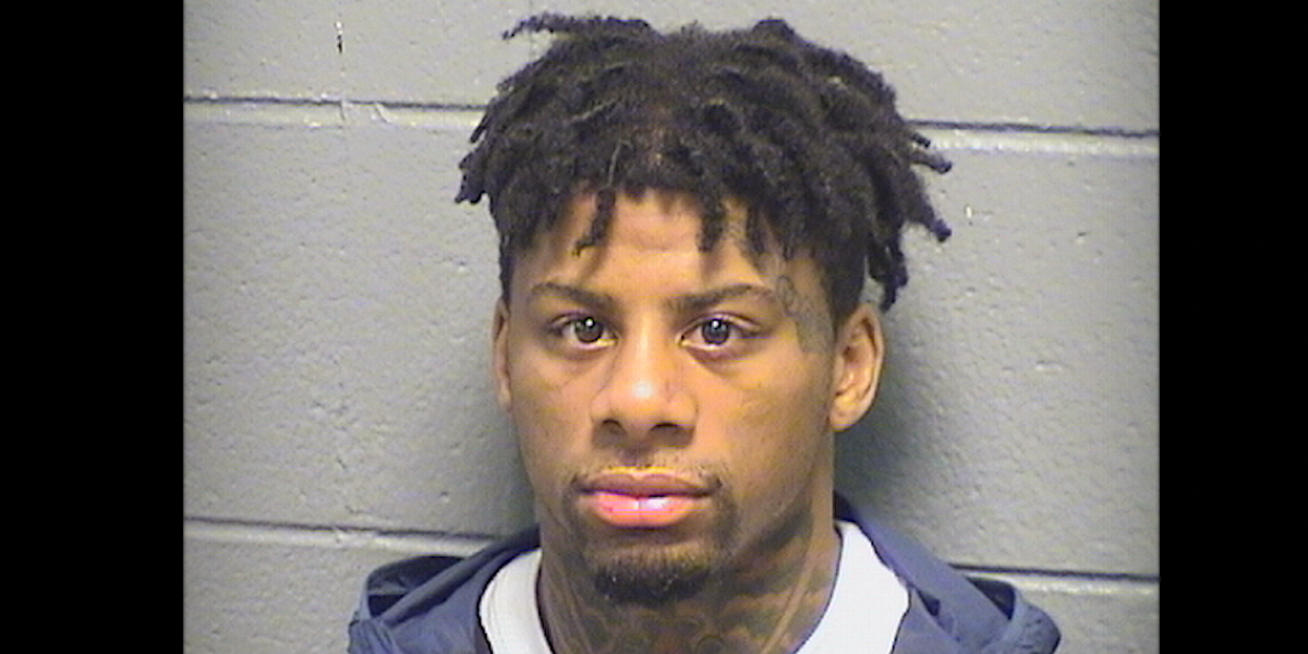 Man taken into custody nearly two months after a couple willingly surrendered their belongings to armed individuals outside their house.