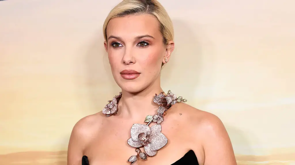 Millie Bobby Brown displays her fit and sun-kissed body in a bikini.