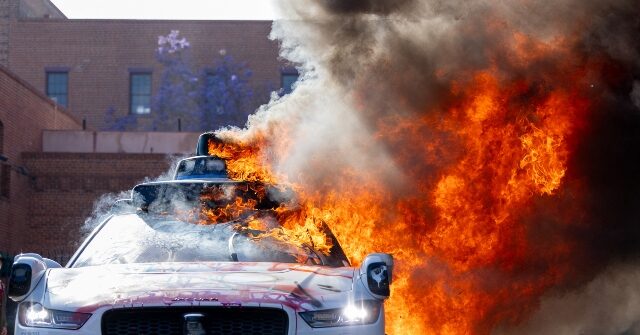 Protesters Set Fire to Waymo Self-Driving Cars in Downtown L.A.