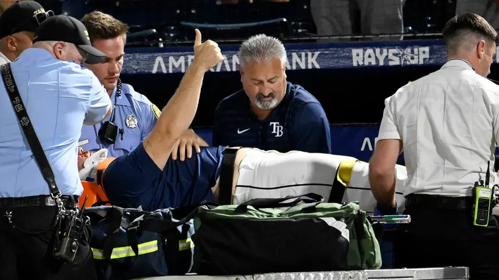 Rays pitcher Hunter Bigge taken away on a cart after a 105-mph foul ball hits his face.
