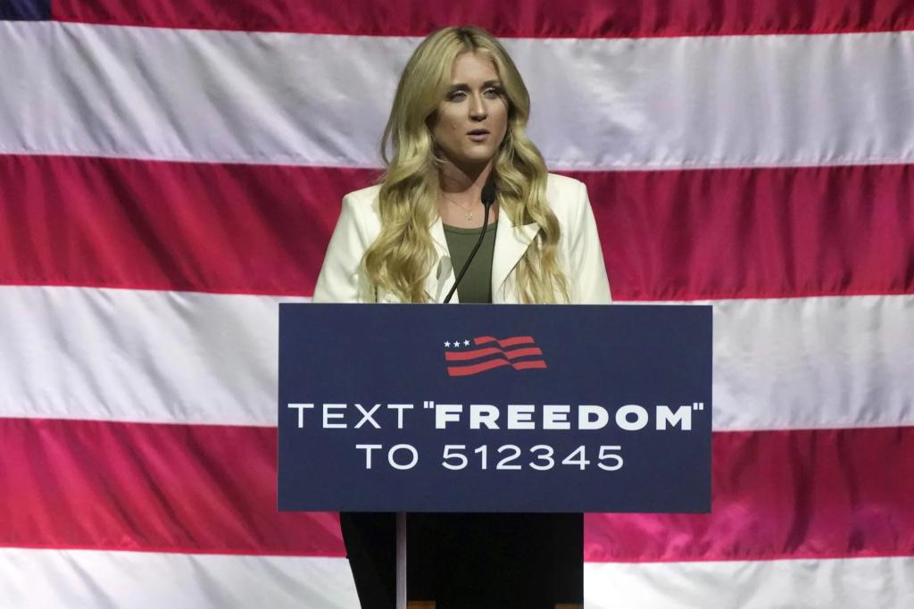 Riley Gaines' witty responses make us question whether it's really Simone Biles behind those trans-extremist messages.