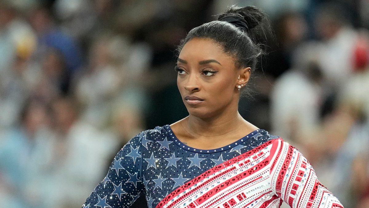 Simone Biles, an Olympic gold medalist, encounters criticism following her dispute with Riley Gaines.