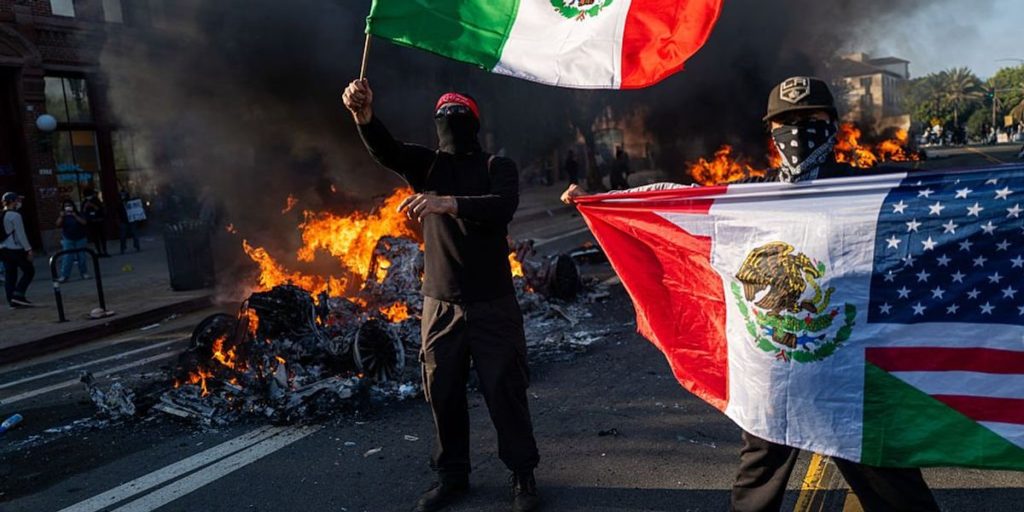 The U.S. is under attack as groups set flags and cities on fire