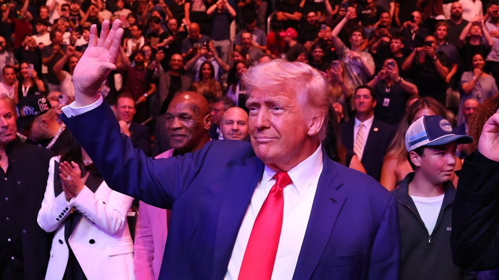 Trump gets a warm reception at UFC 316 as his feud with Musk carries on