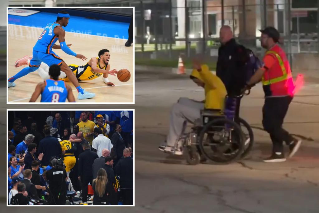 Tyrese Haliburton appears in a wheelchair at the airport following his injury