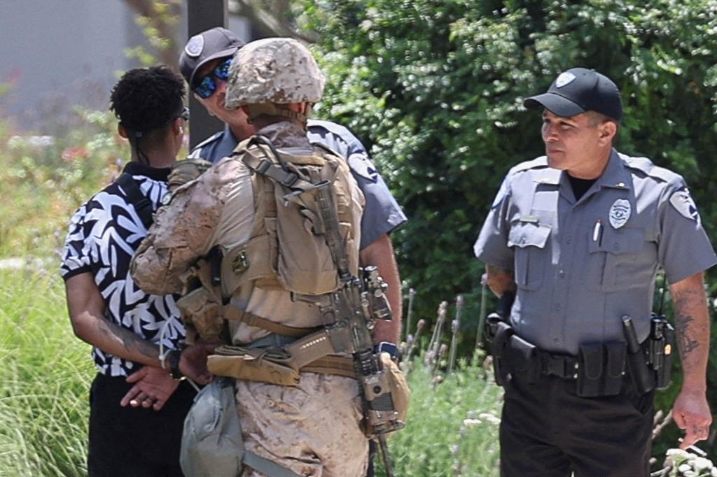 US Marines briefly hold a civilian — an Army veteran — for the first time in Los Angeles