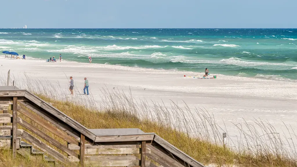 Unidentified black packages appear on a beautiful Florida beach