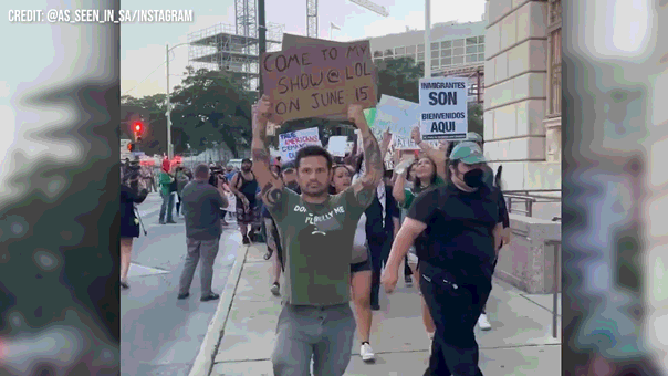 Veteran joins immigration protests to advertise comedy event