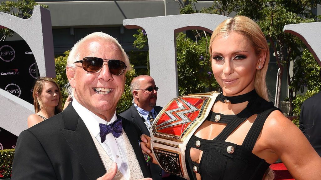 WWE star Charlotte Flair experiences her father's legacy as a constant pressure.