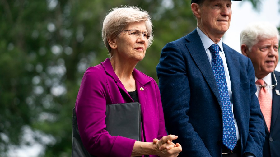 Warren questions if X is breaching sanctions with 'blue checks'