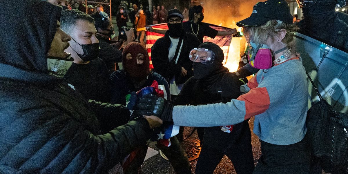 Activist taken into custody after violent incident involving reporter at anti-ICE protest in Seattle