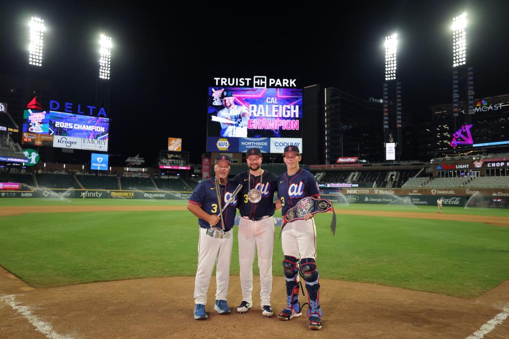 Cal Raleigh shares a touching moment with his dad and brother during the Home Run Derby.
