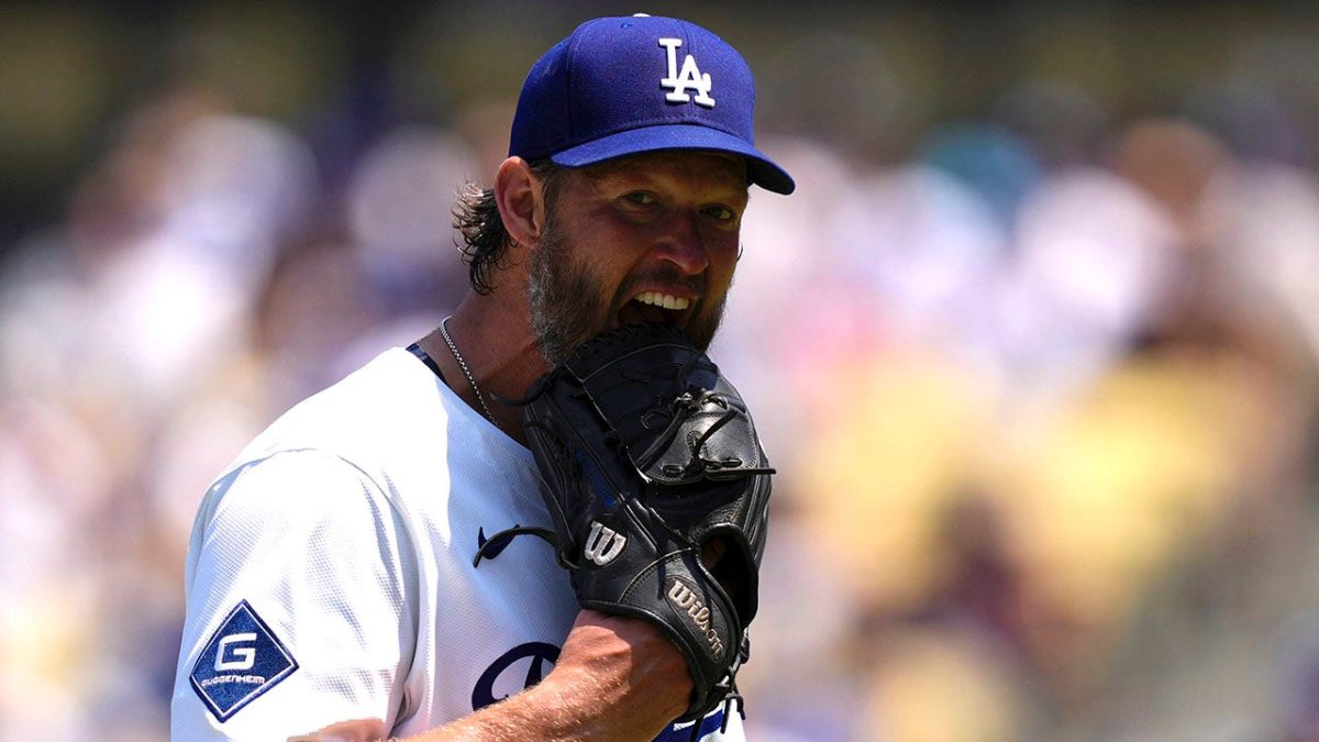 Clayton Kershaw of the Dodgers expresses anger by throwing his glove and hat.