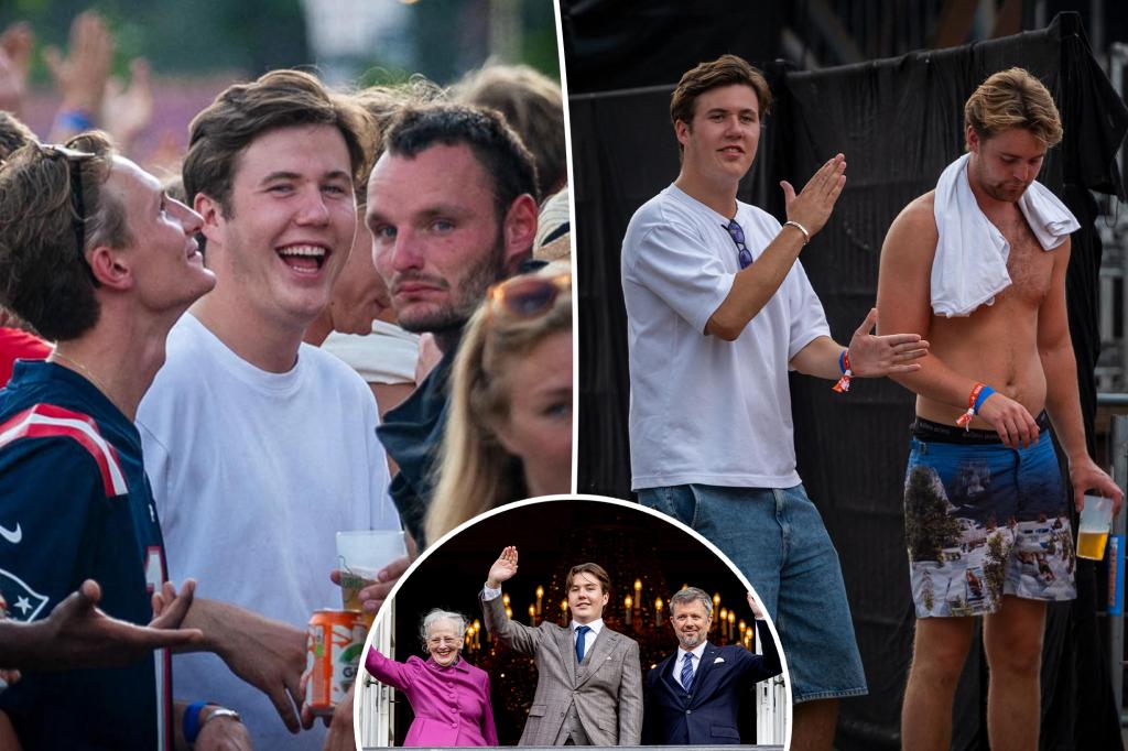 Crown Prince Christian of Denmark, 19, celebrates with friends at Roskilde Festival.