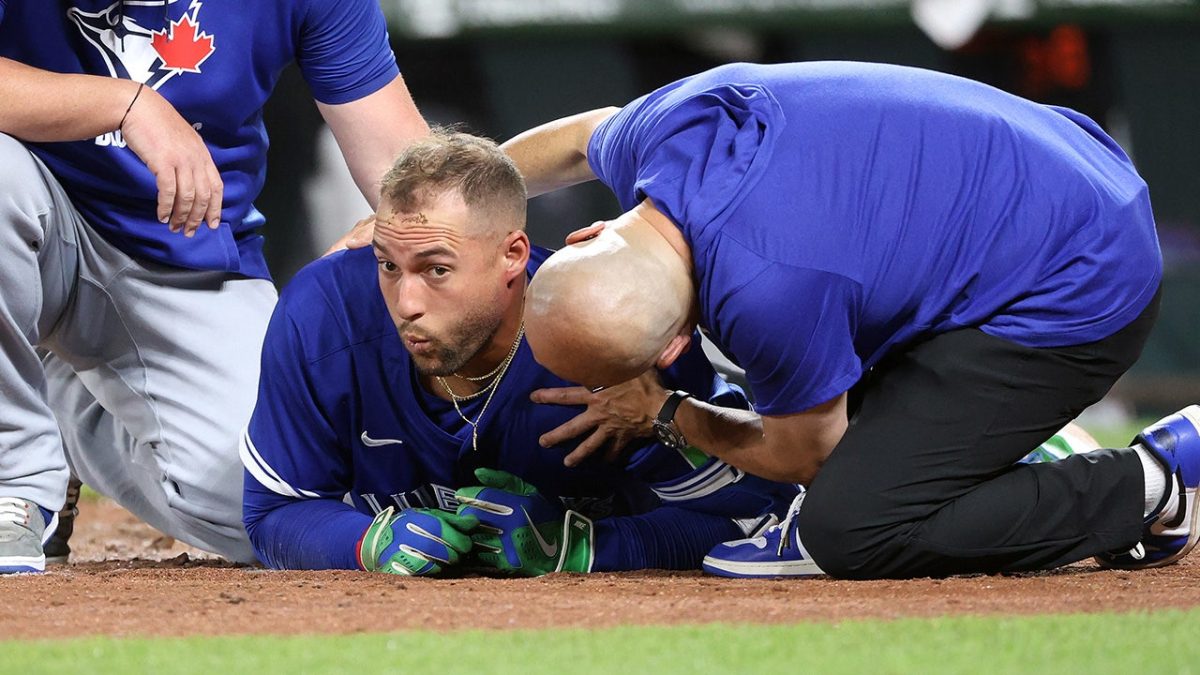 George Springer of the Blue Jays exits game after being struck in the head by a 96 mph pitch