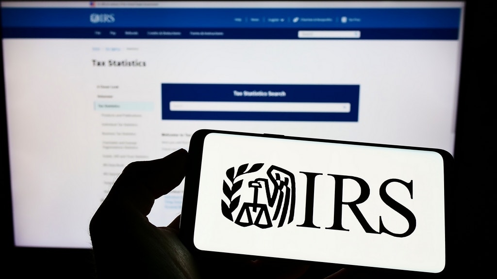 Her husband skipped out on $82,000 in taxes, and now the IRS intends to seize their home. She's divorcing him, yet still wants to help him.