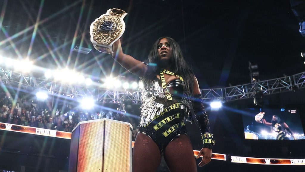 Naomi takes the championship from Iyo Sky and Rhea Ripley at WWE Evolution.