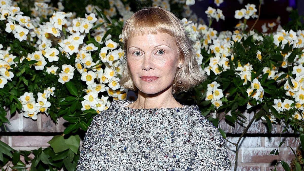 Pamela Anderson dismisses the label of sex symbol at 58 and embraces her natural appearance.