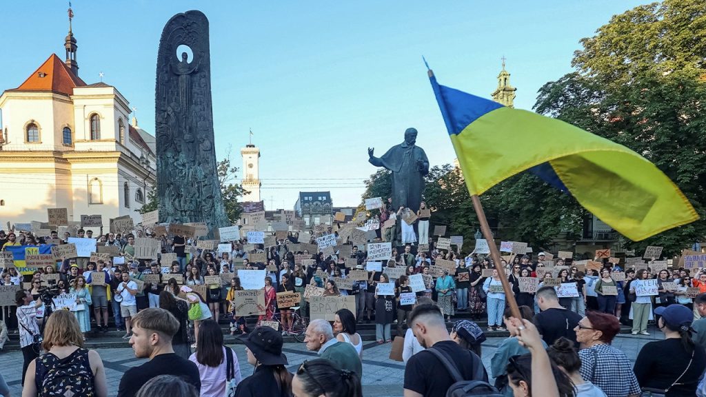 Protests erupt throughout Ukraine over anti-corruption legislation as Zelenskyy blames Russia.