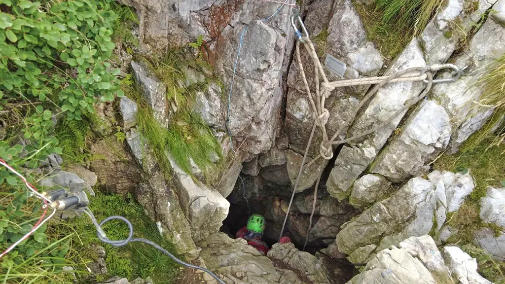 Rescue teams use explosives to save trapped and injured explorer from cave in Italy