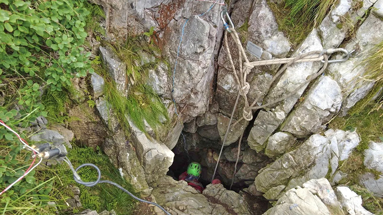 Rescue teams use explosives to save trapped and injured explorer from cave in Italy
