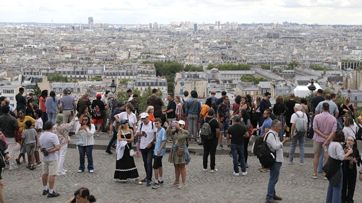 Residents of Paris feel that Montmartre has become like a theme park due to post-Olympics tourism.