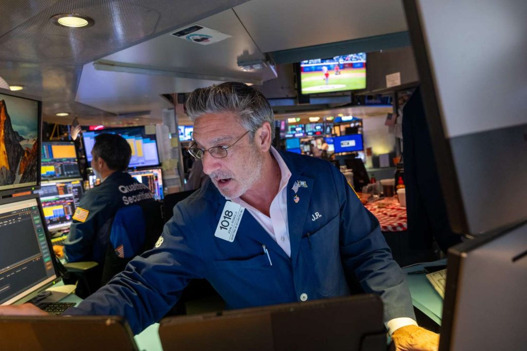 S&P 500 and Nasdaq Reach New Peaks While Dow Falls in Response to Earnings Reports; Tesla Shares Drop, Alphabet Gains After Results