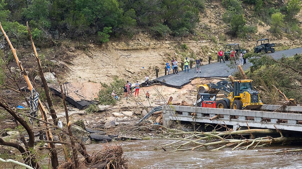 Texas police advise residents looking around to stay away from flood recovery zones.