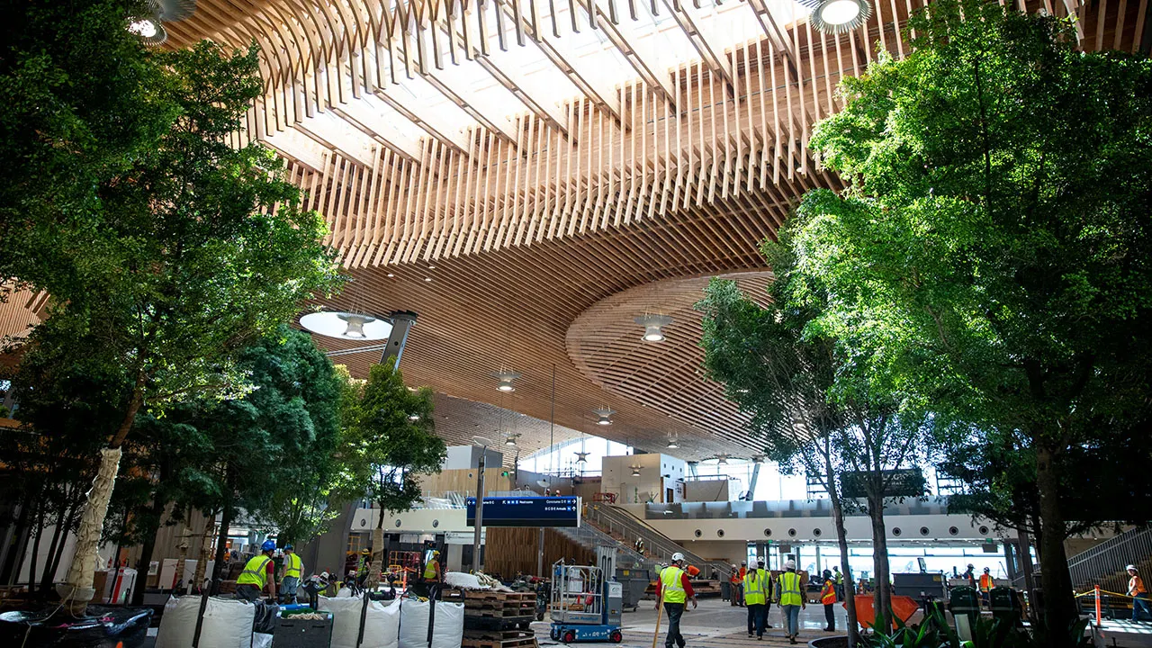 The country's top airport includes therapy llamas and decor inspired by the 1980s.