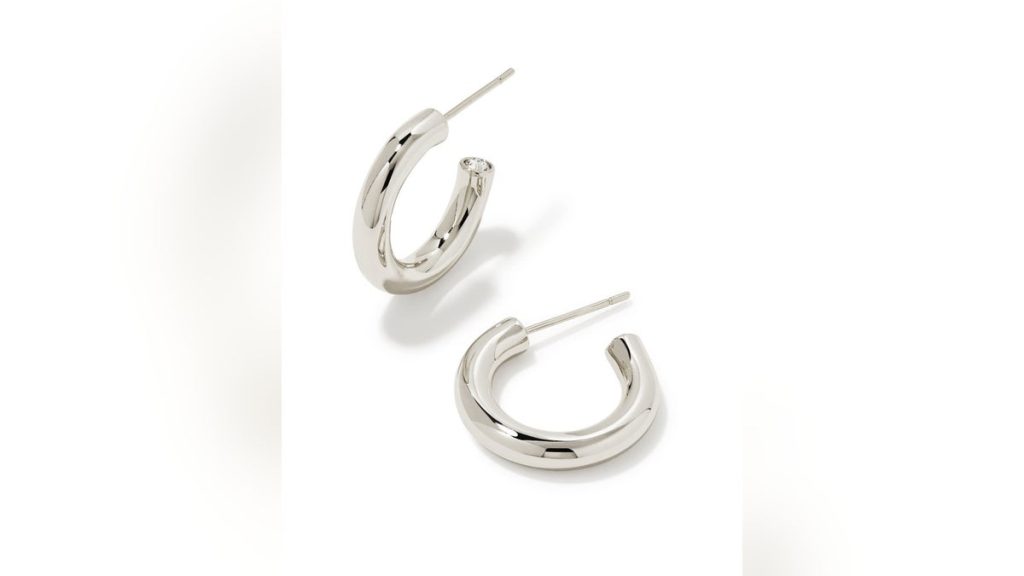 These popular huggie earrings enhance your jewelry collection with a touch of sparkle.