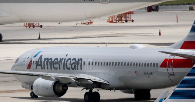 Travelers in a hurry leave AA Plane using slides during fire in Denver