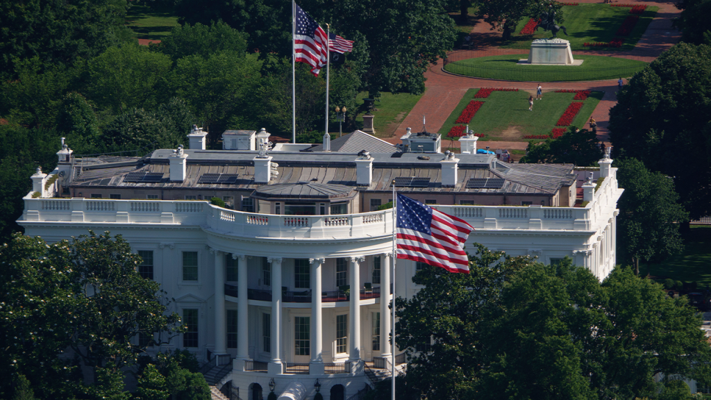 Trump places large American flags at the White House using his own money