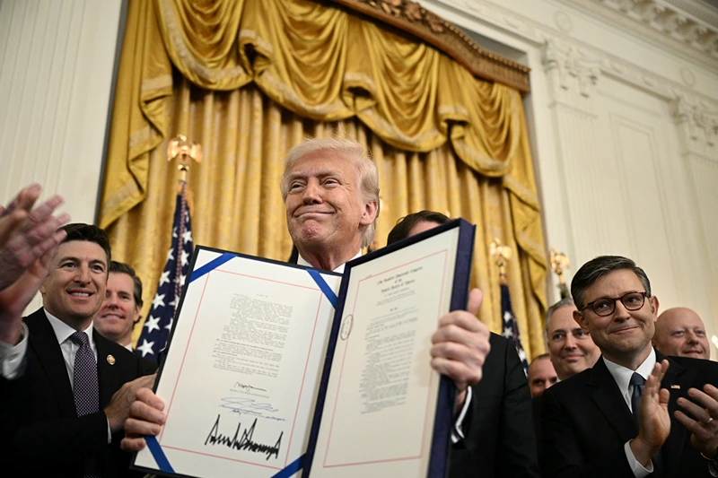 Trump signs the ‘GENIUS Act’ into law, describing it as the ‘biggest change in financial technology’