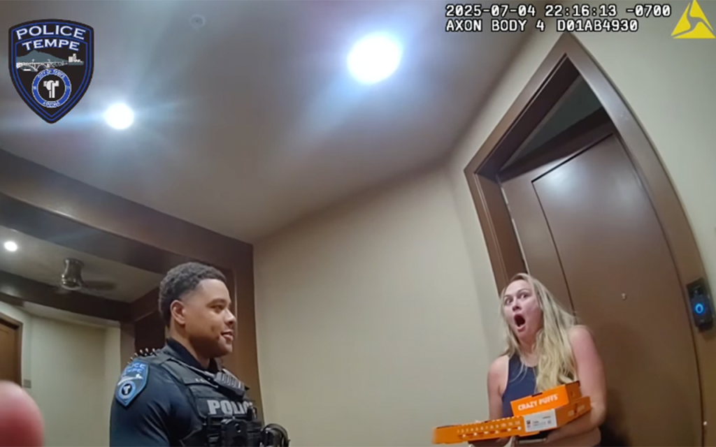 Video goes viral of police officers delivering pizza after a delivery driver was taken into custody.