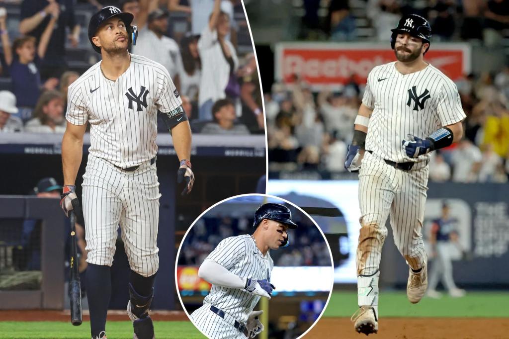 Yankees surge with home runs after rain break to defeat Mariners